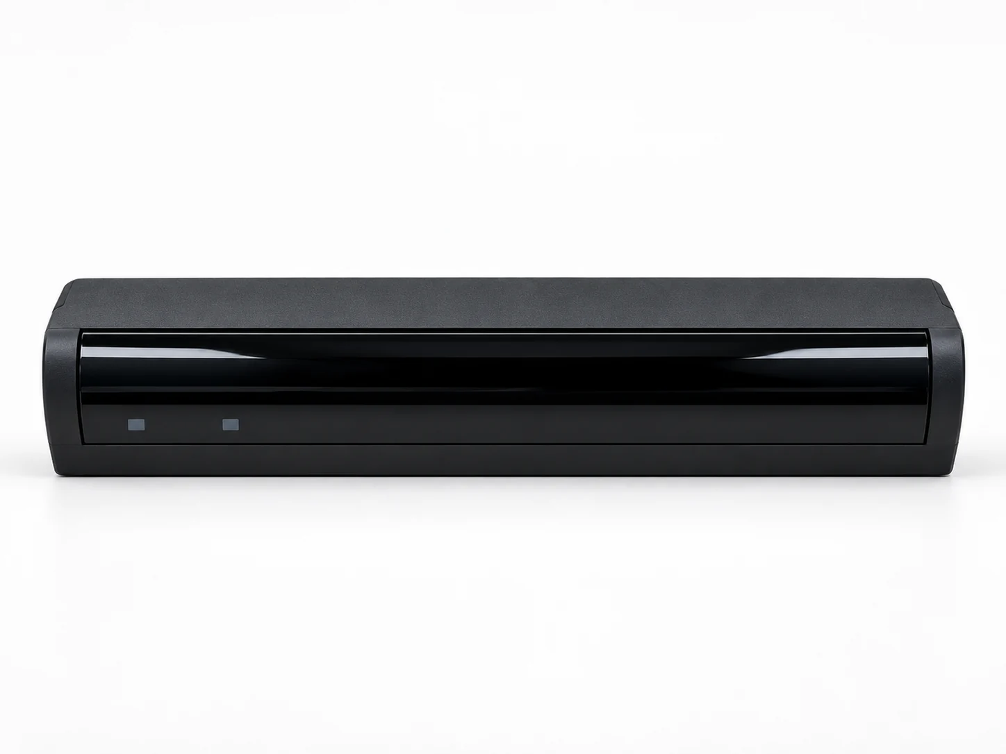 Black rectangular sensor housing with rounded corners and a dark front window