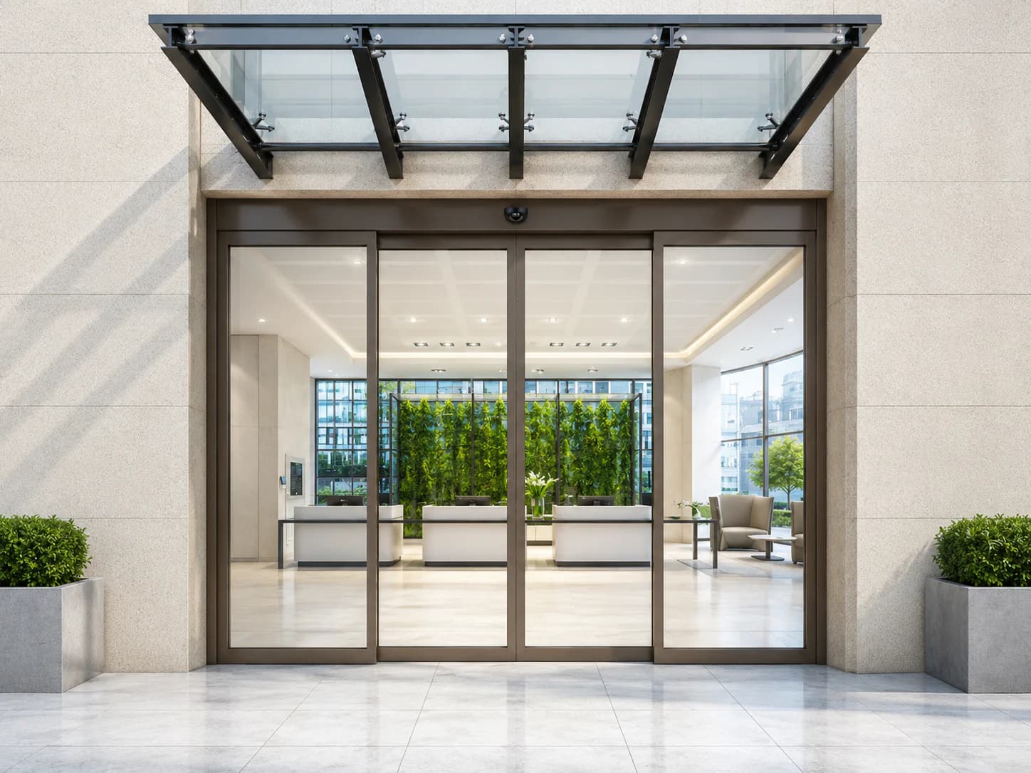Bi-parting automatic sliding glass door at an office building main entrance
