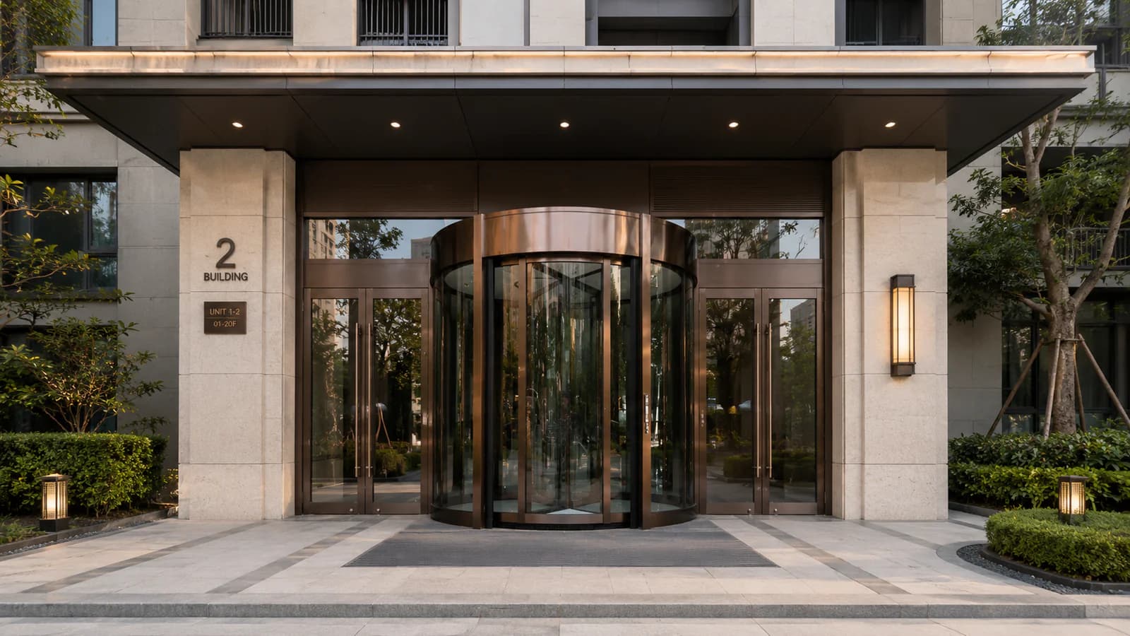 Automatic revolving glass door at an apartment building entrance