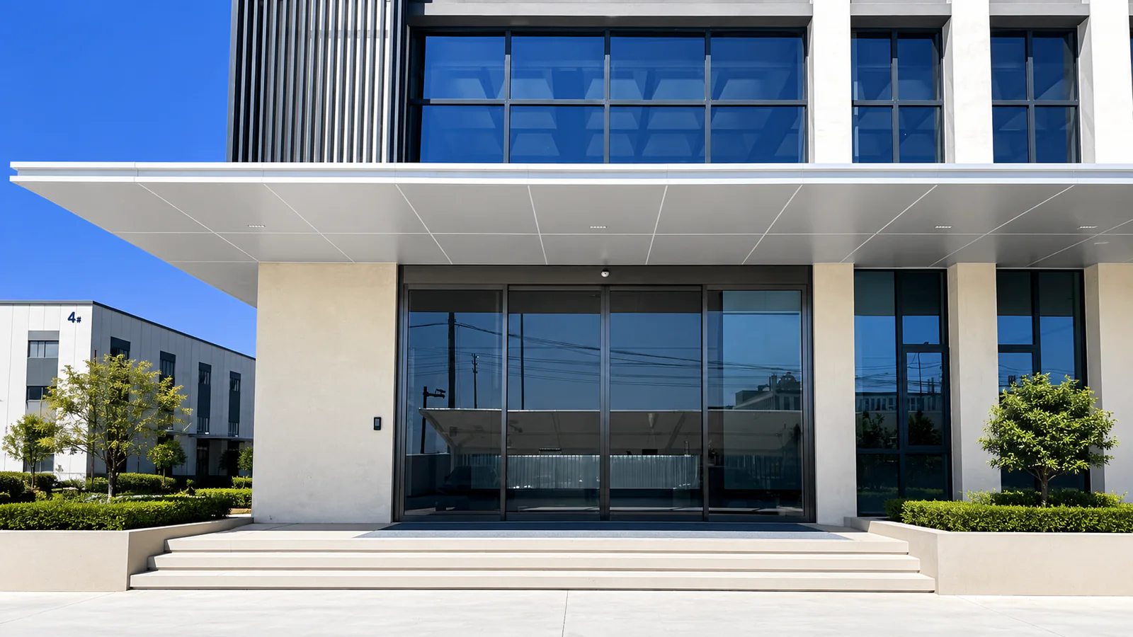 Automatic sliding glass door at an office building entrance