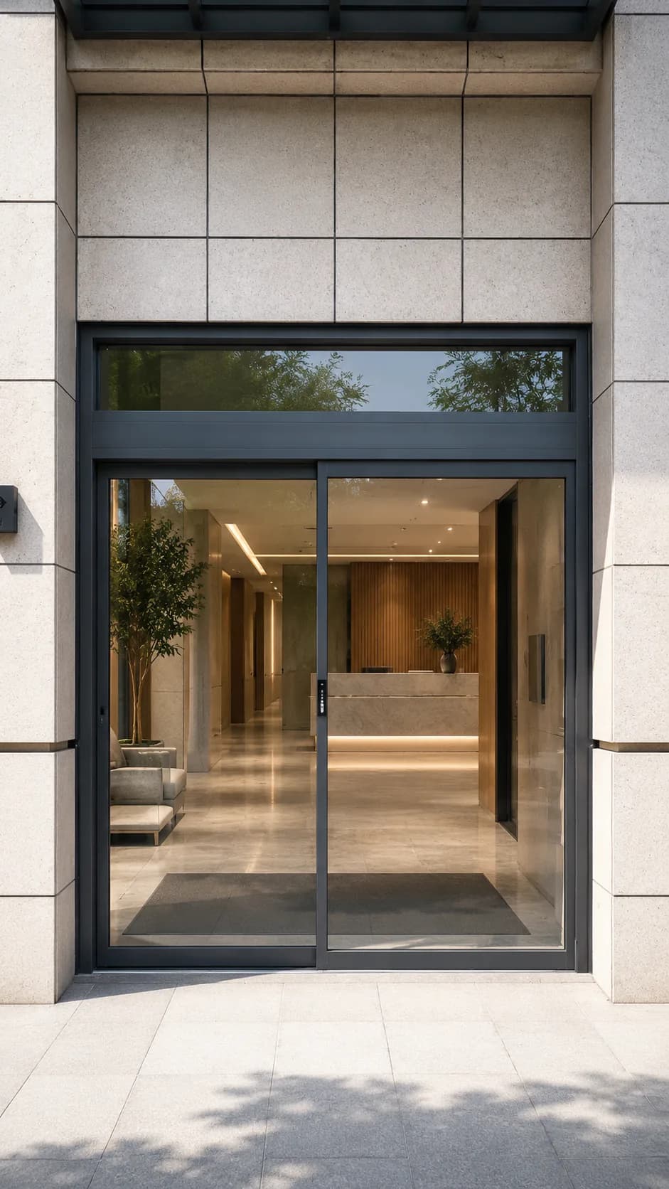 Automatic sliding glass door at a modern commercial entrance